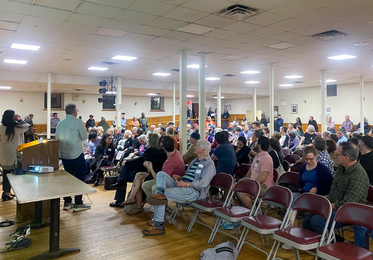 seated audience listening to a speaker