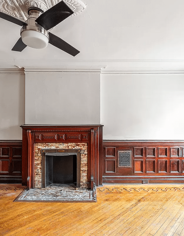 wainscoting and mantel in the bedroom