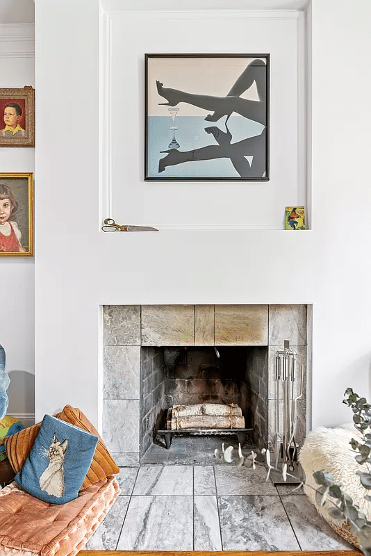 wood burning fireplace in living room