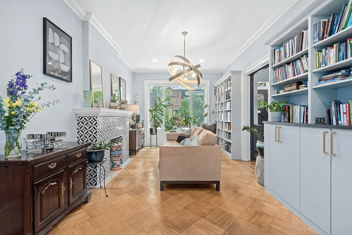 crown heights - living room with tiled mantel, blue book shelve
