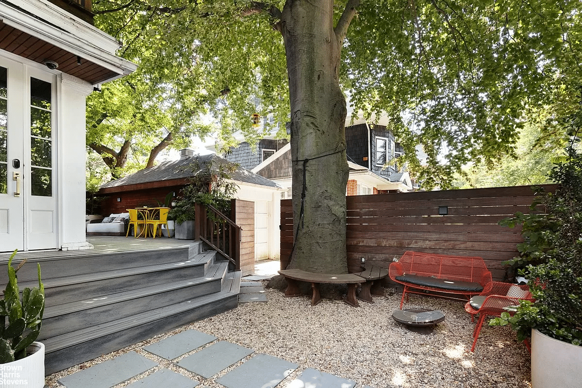 rear yard with horizontal fence, deck