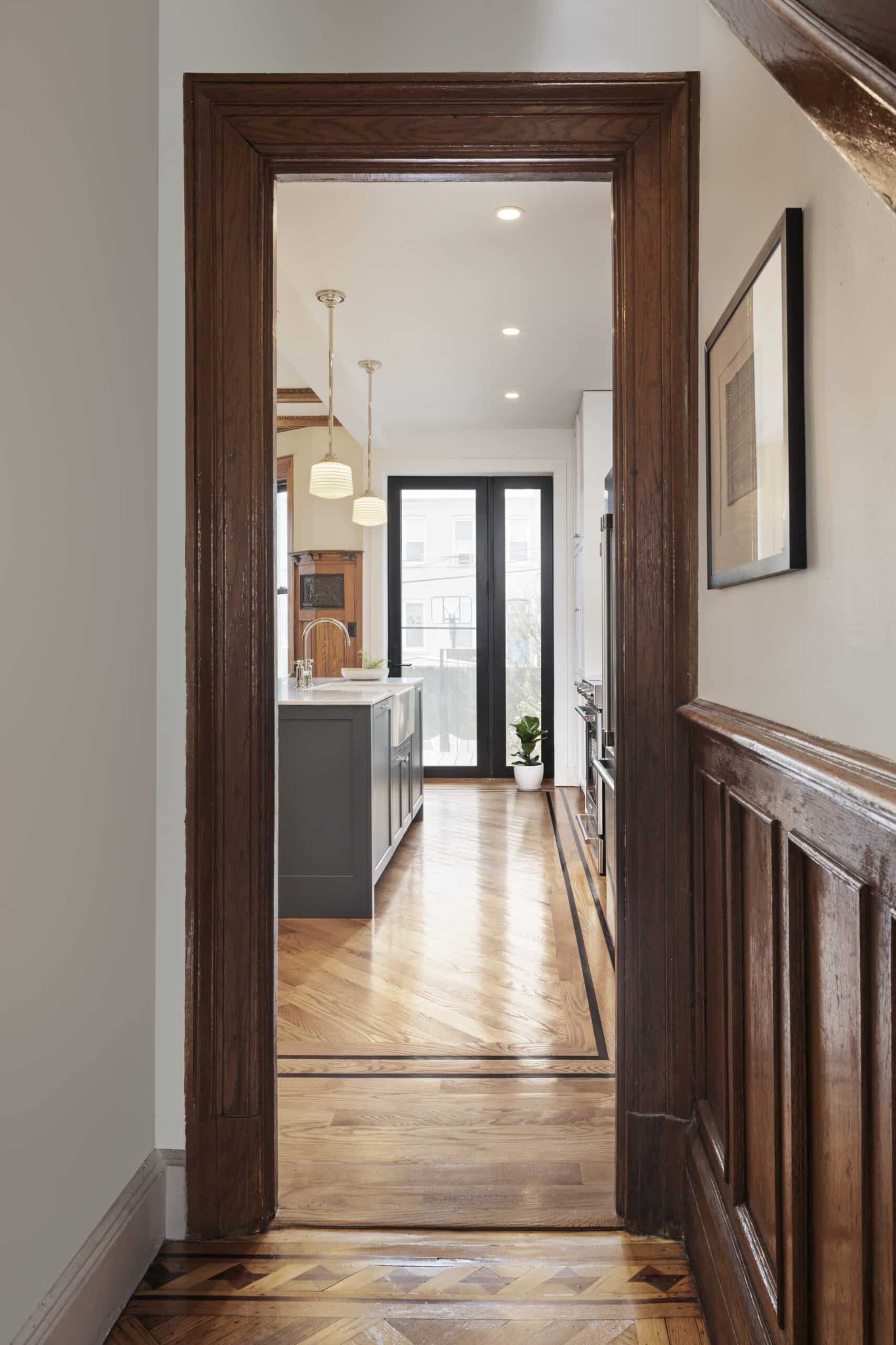 VIEW DOWN HALL TO KITCHEN