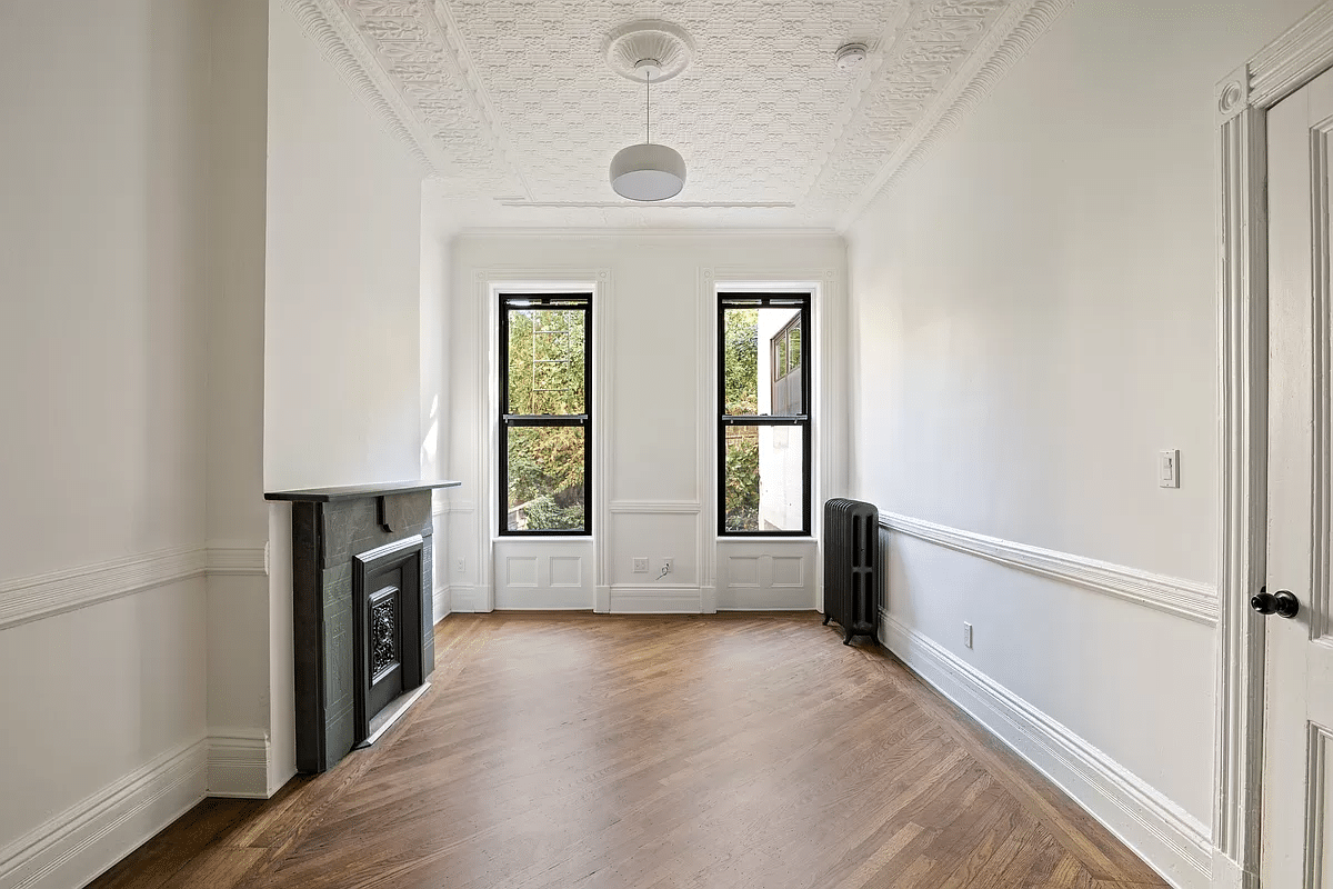 bedroom with tin ceiling