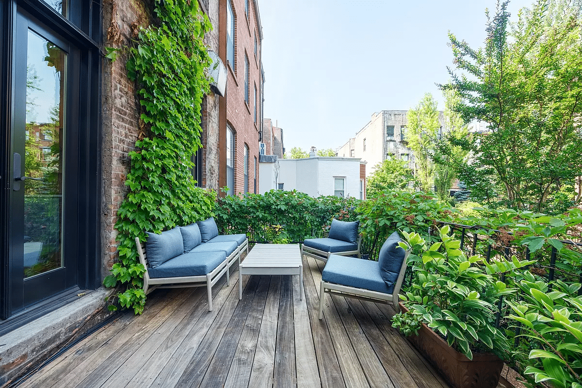 rear deck with room for seating and planters