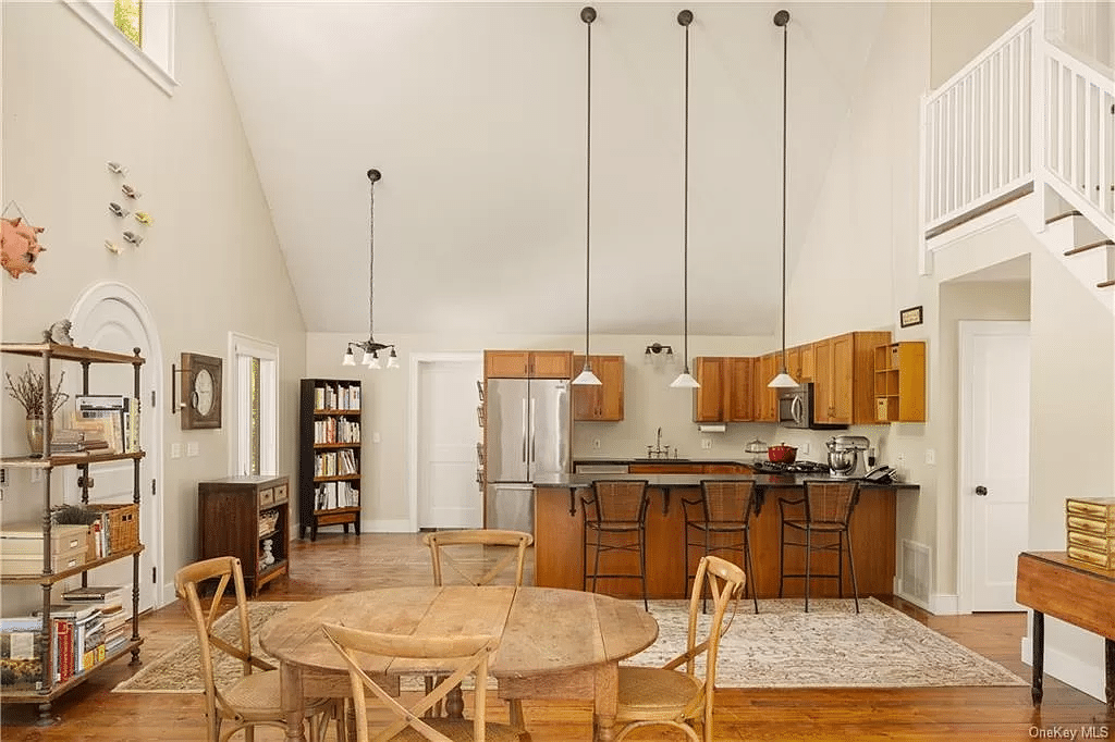 open plan main level of the guest cottage with kitchen and dining room