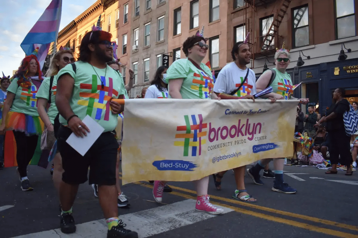 Brooklyn Pride - people holding a banner at the parade