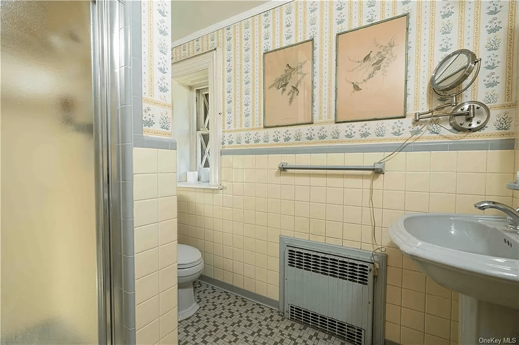 bathroom with vintage yellow and grey tile