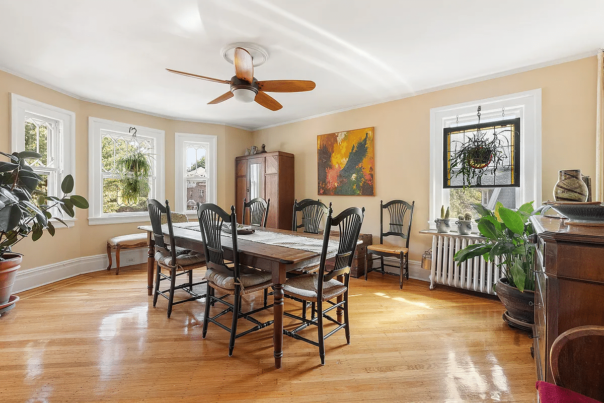 dining room with two exposures with wood floor