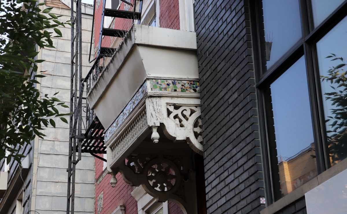 brooklyn - a wood door hood with mosaic ornament in Williamsburg