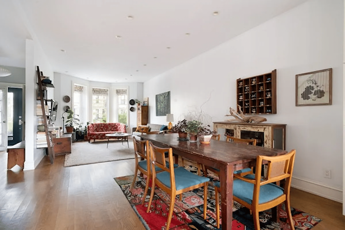 open plan living and dining room in a plg row house