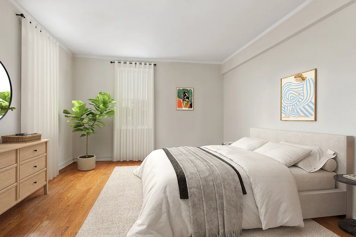 staged bedroom with wood floor, room for dresser, side tables and bed