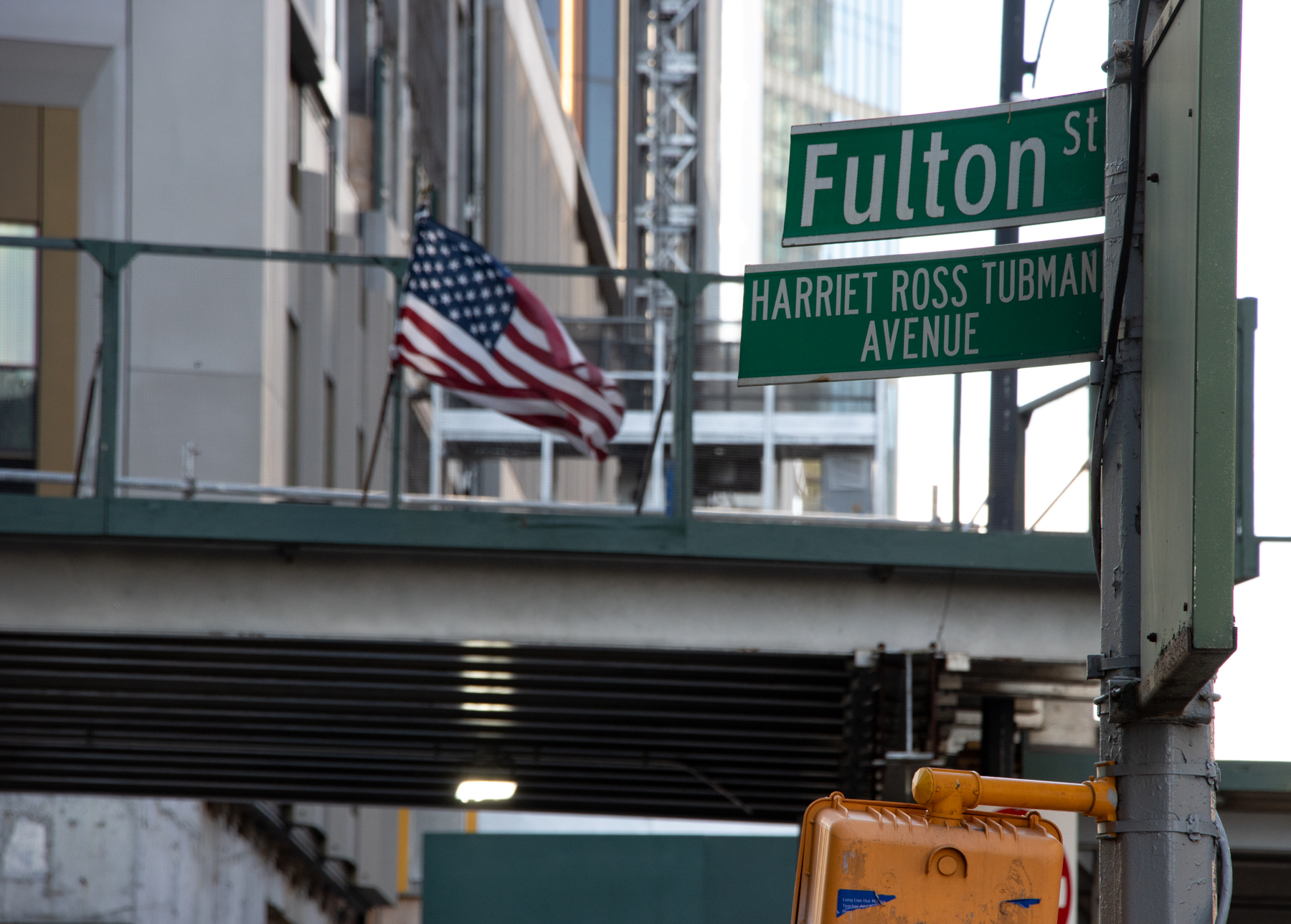 brooklyn - street signs for fulton street and harriet ross tubman avenue in downtown brooklyn