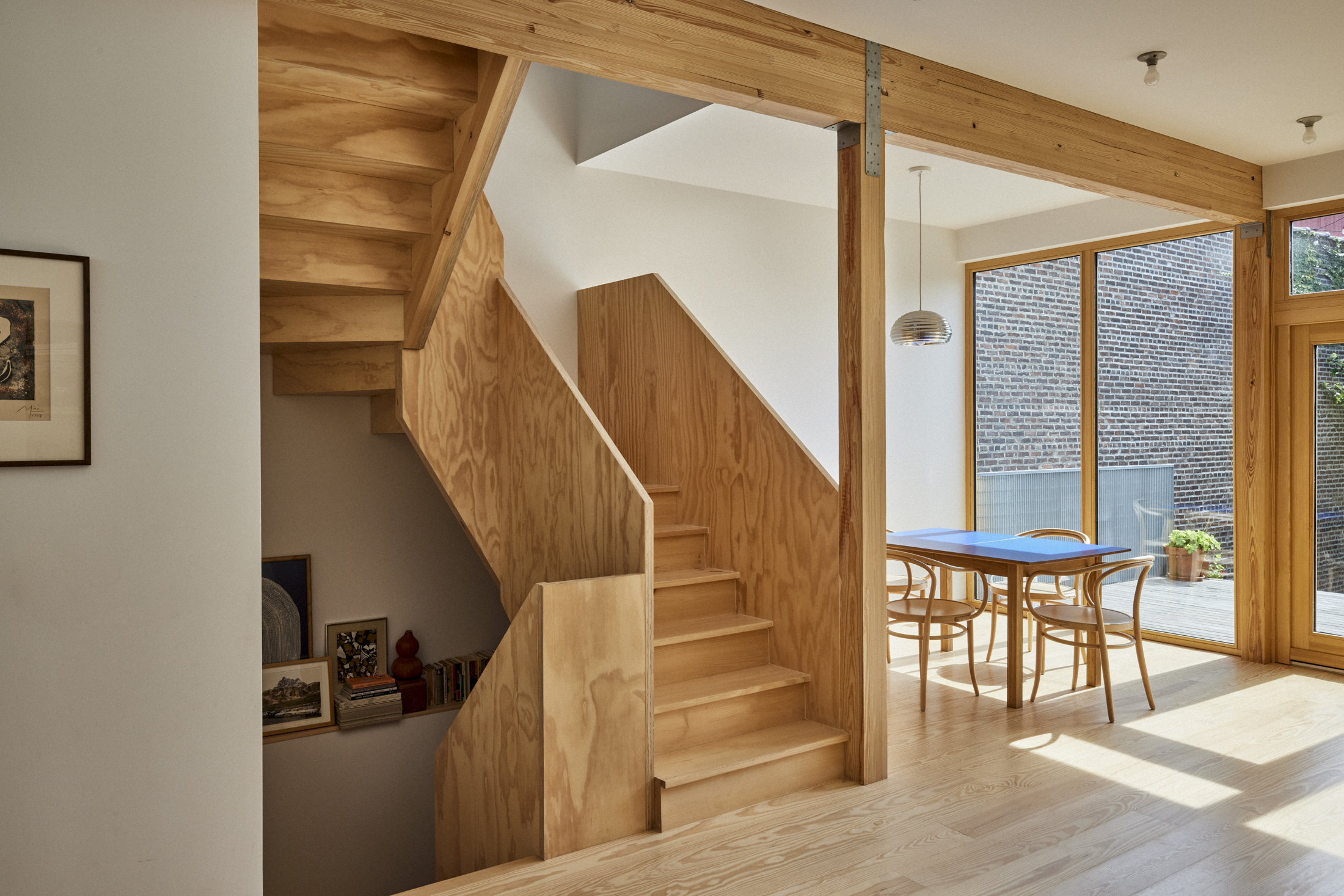 PLYWOOD STAIRCASE DINING ROOM