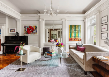 prospect lefferts gardens - a parlor with a pier mirror and wood floor