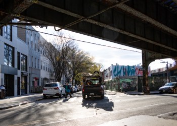 bushwick - truck underneath the elevated rail on myrtle avenue