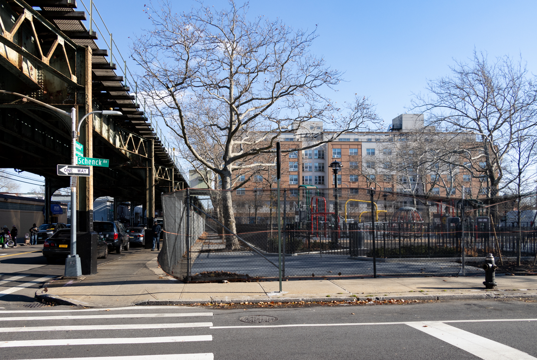 view of the chain link fence and netting surround the park while it is under construction