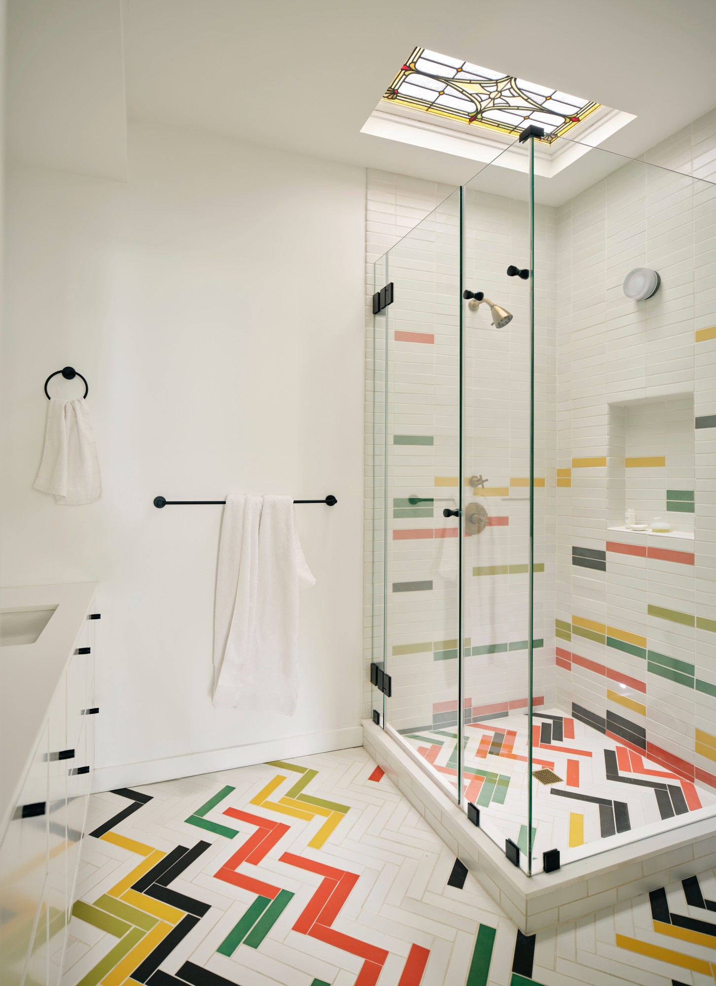 STALL SHOWER WITH JAZZY TILEWORK