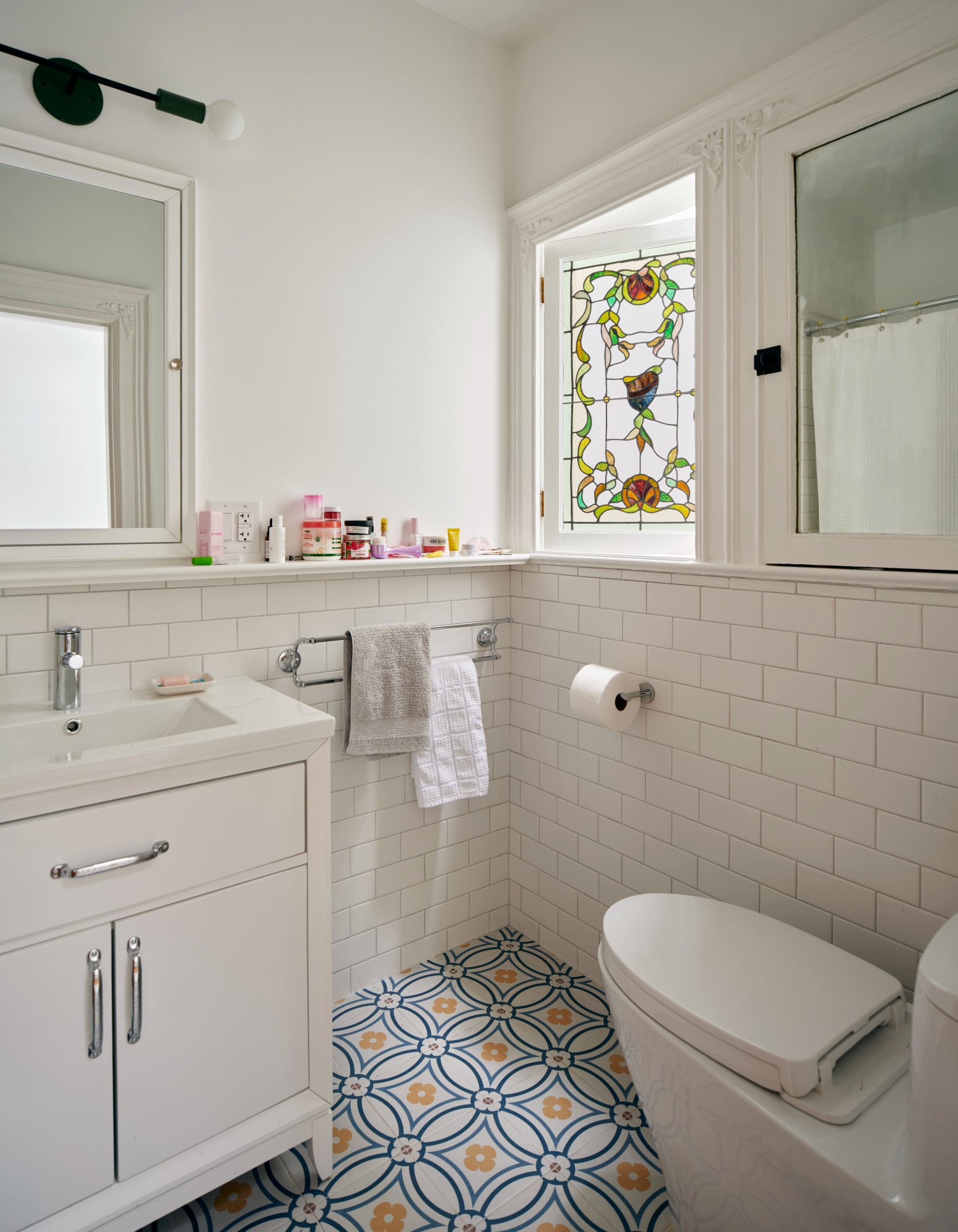 BATH WITH STAINED GLASS WINDOW