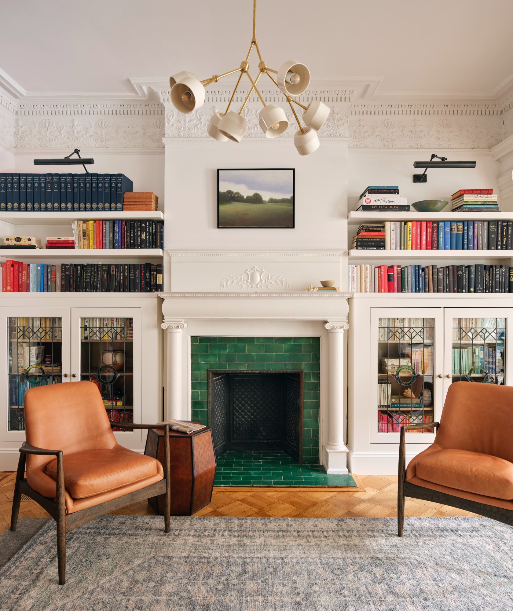 SITTING AREA WITH GREEN FIREPLACE SURROUND
