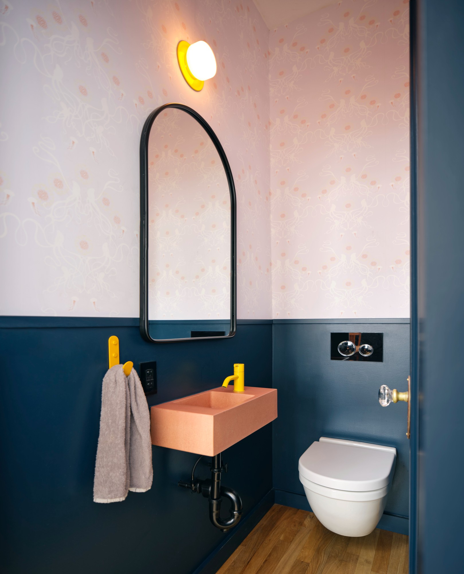 BLUE POWDER ROOM WITH PINK SINK