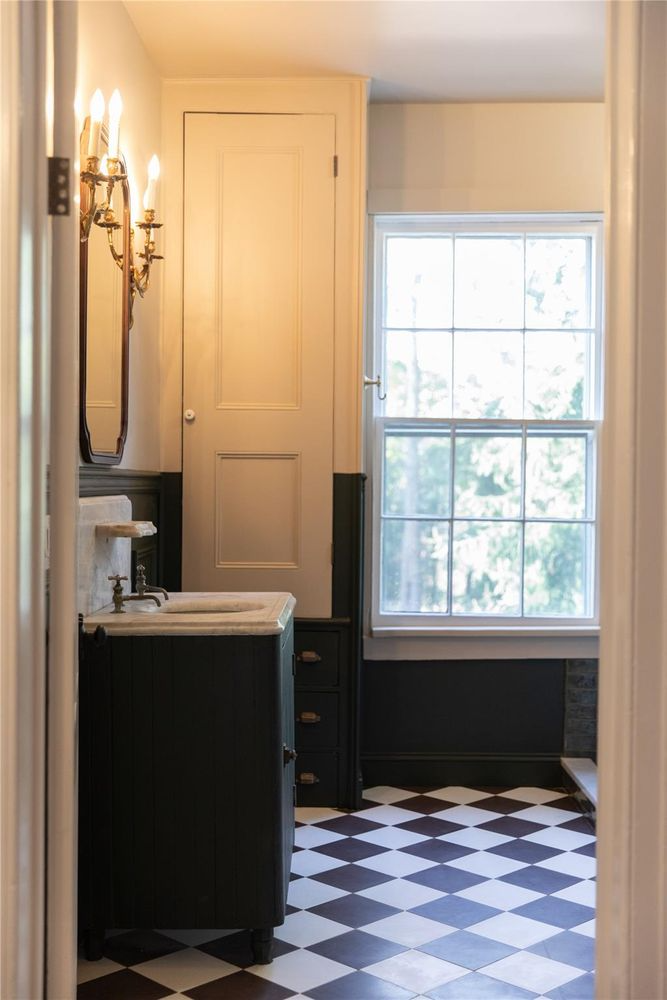 bathroom with checkerboard floor