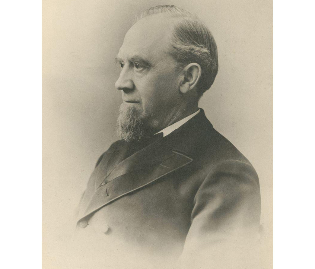 morris building co - sepia toned image of charles pratt in profile wearing a suit