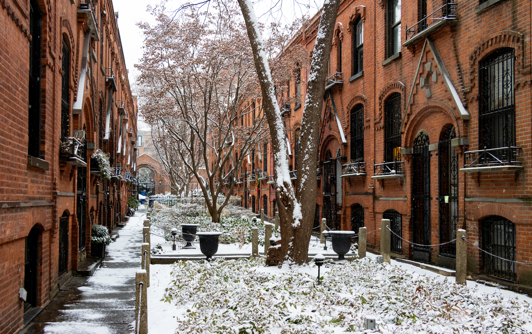 brooklyn - snow falls on the 19th century brick houses in cobble hill's warren place mews