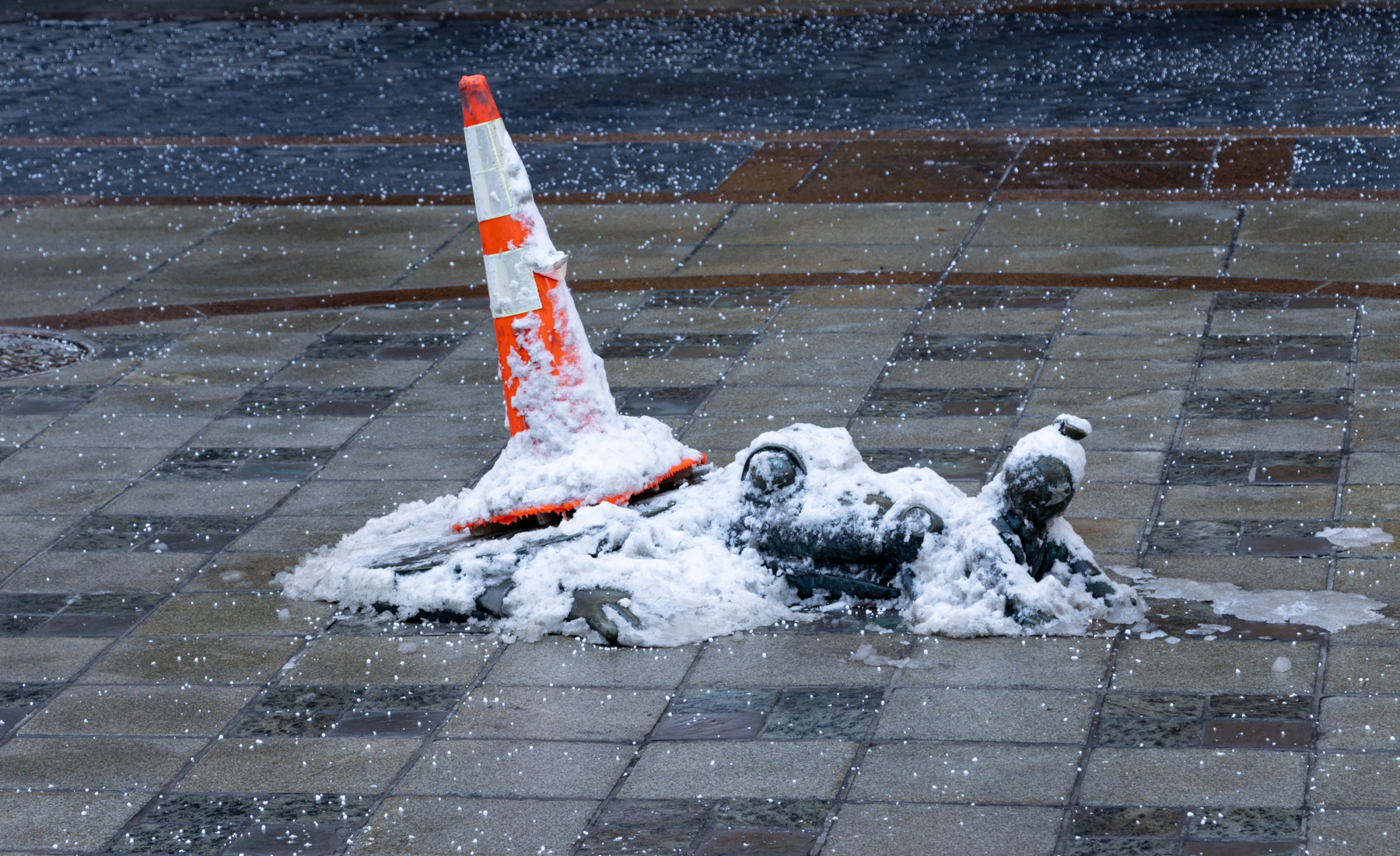 brooklyn - an alligator sculpture in downtown brooklyn covered with snow
