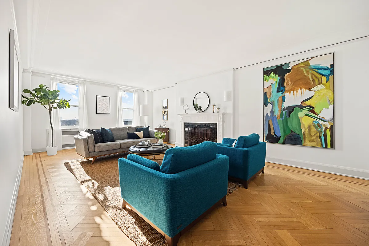 park slope - living room with wood floor, mantel, two windows with tree-top views