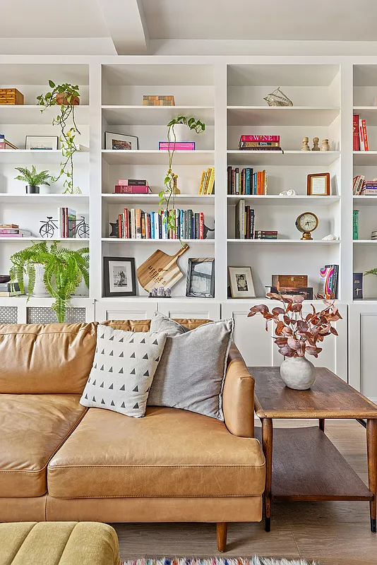 living room with bookshelves