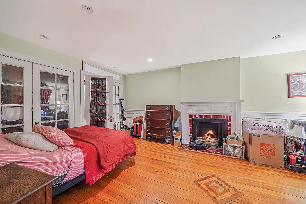 original dining room on garden level with mantel, wainscoting
