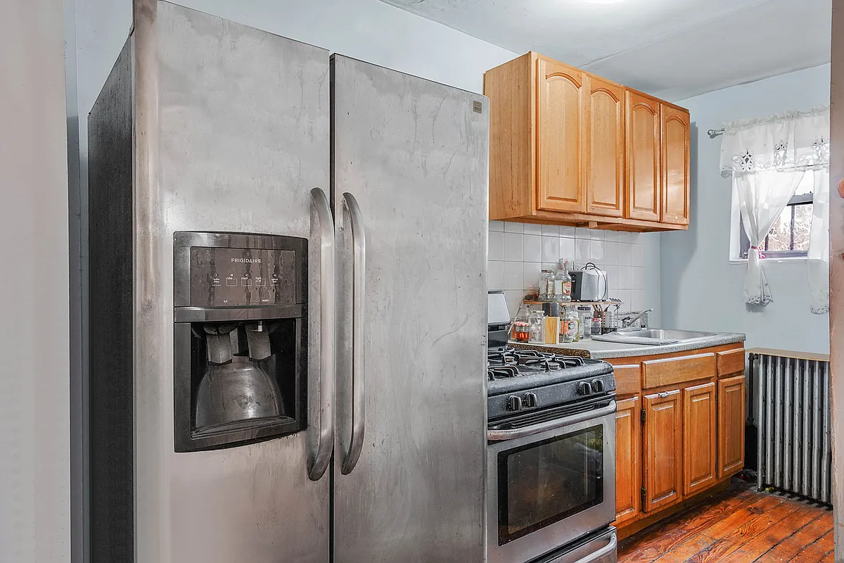 kitchen with wood cabinets, stainless steel appliances