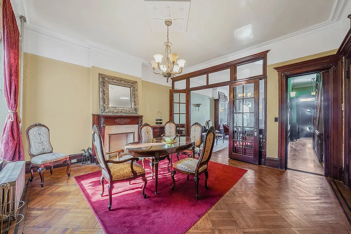 dining room with french doors, mantel