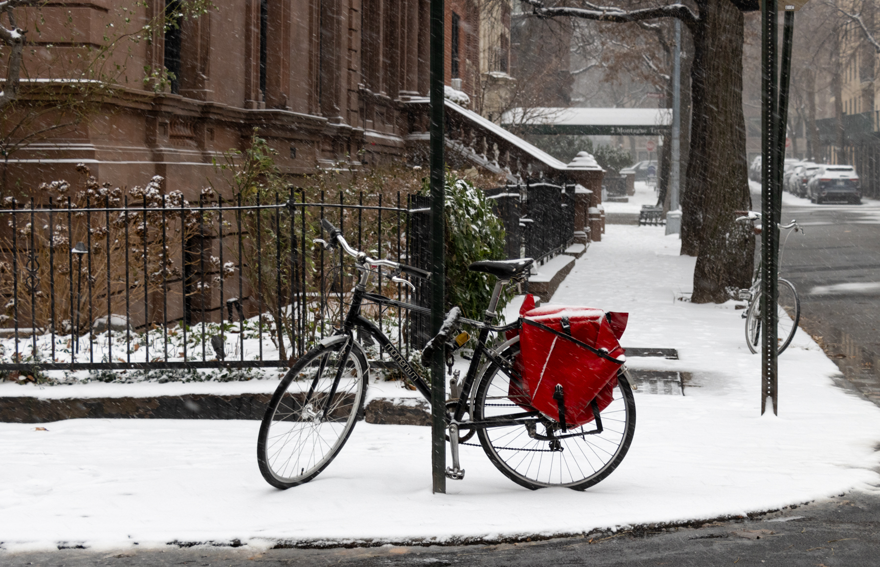 brooklyn - a snowy bike on a corner in brooklyn heights