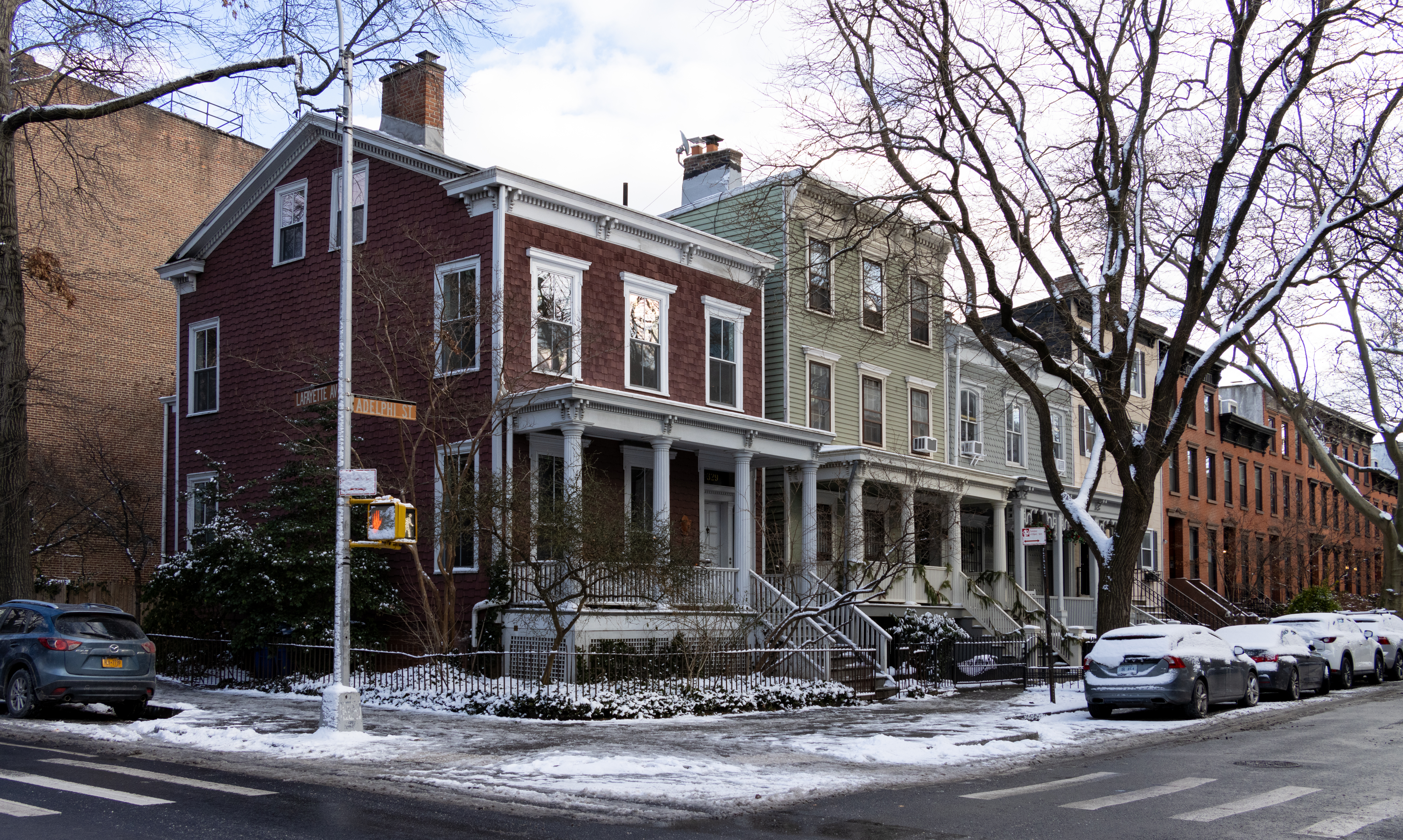 brooklyn - snowy street with wood frame houses in Fort Greene