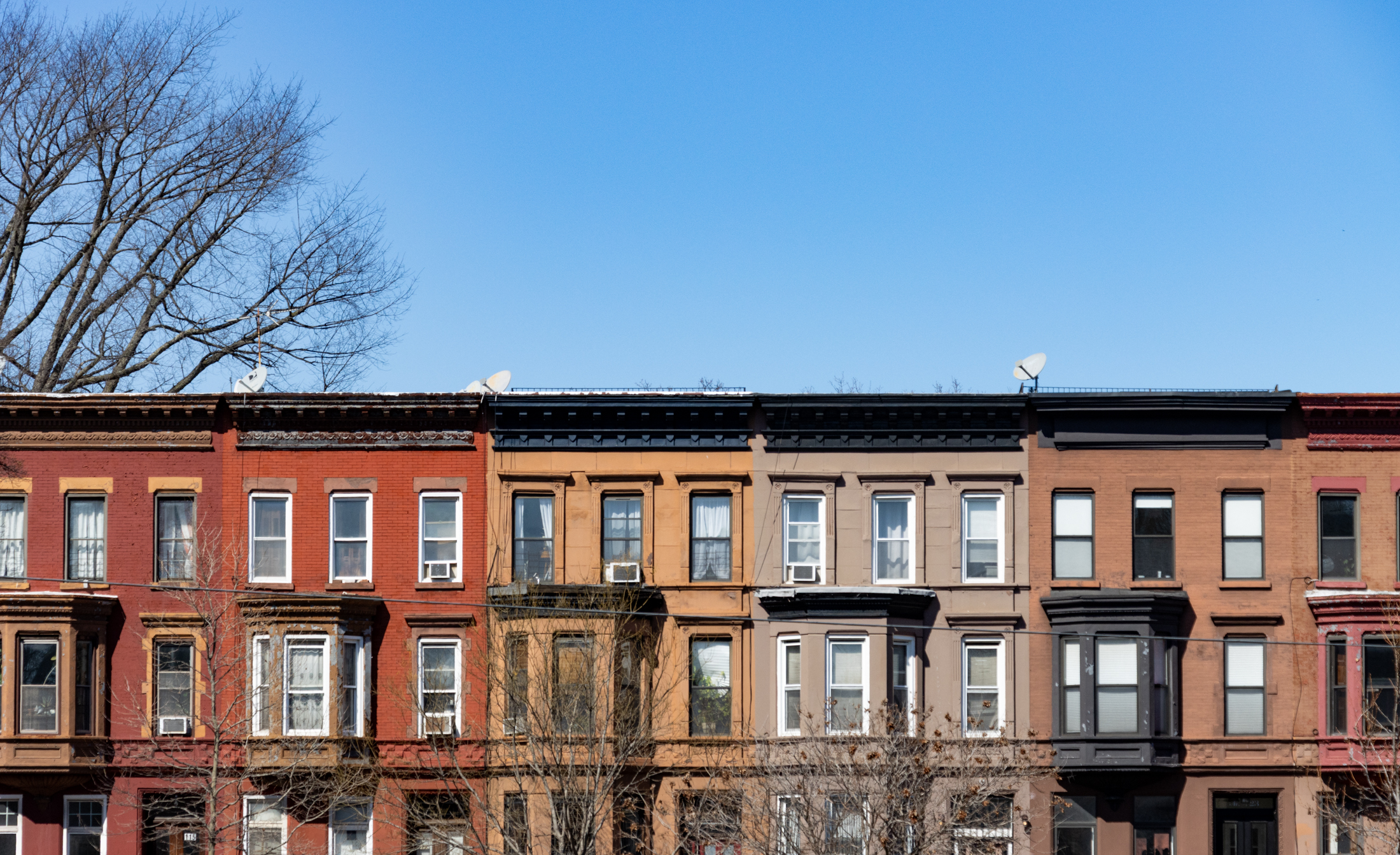 bed stuy - rows of houses with bay windows