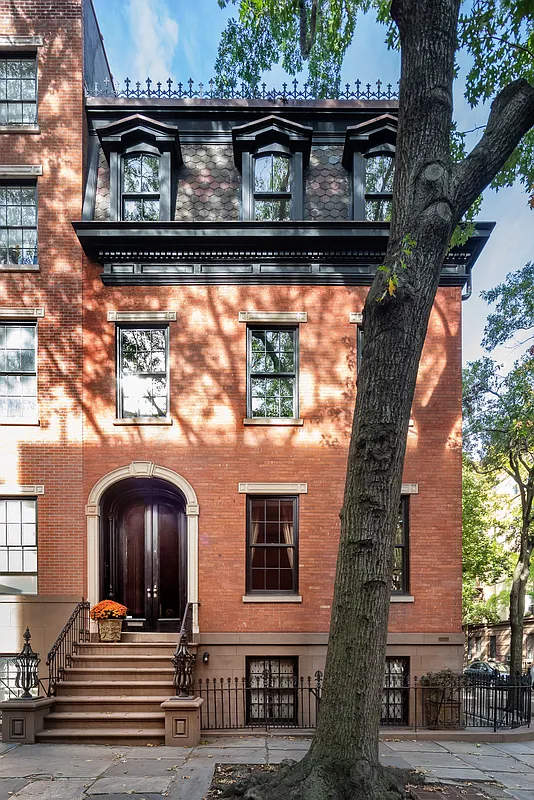 red brick exterior with mansard roof