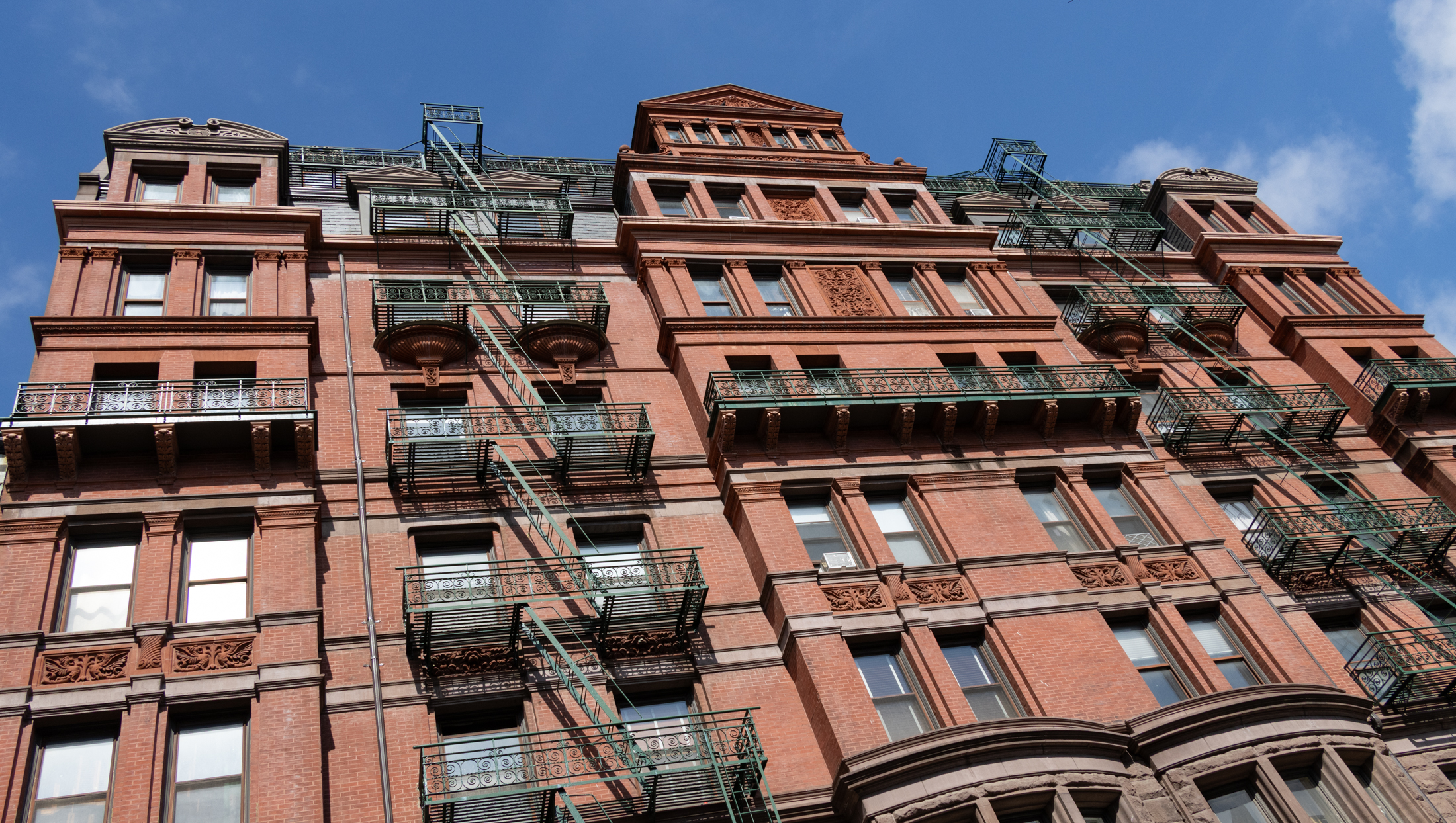 brooklyn - look up at a red brick and terra cotta building at 117 montague street in brooklyn heights