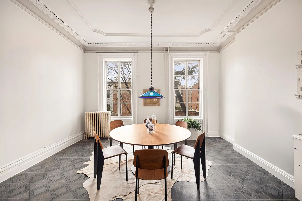 dining room with plasterwork, tile floor
