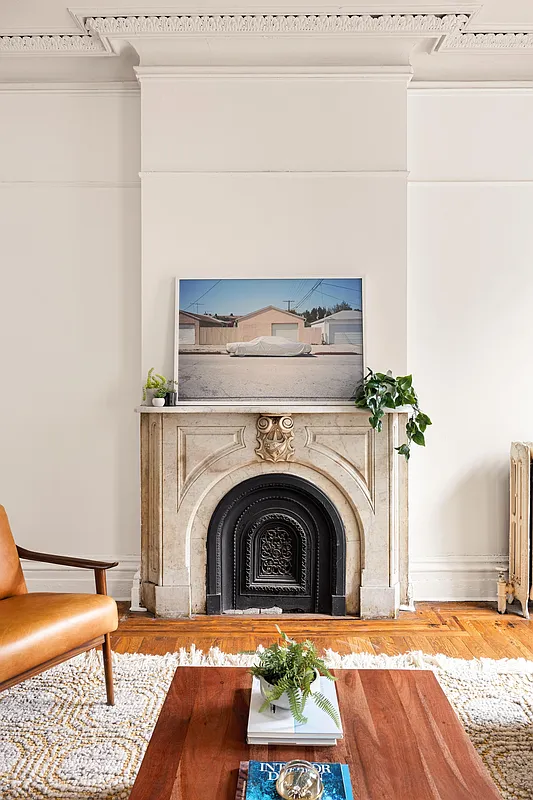 marble mantel and plasterwork in the front parlor