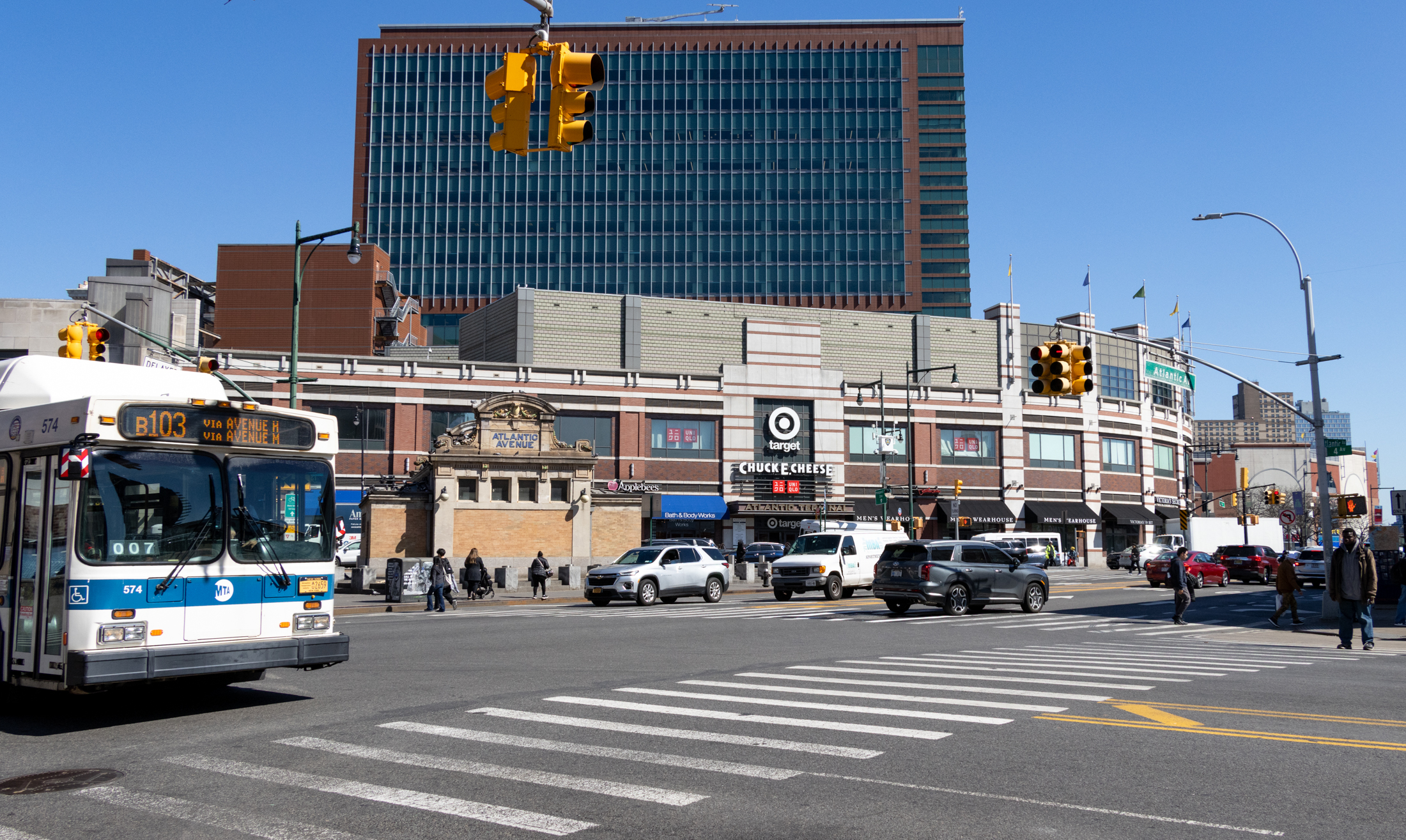 Brooklyn news - a B103 bus crosses atlantic avenue near the atlantic avenue mall