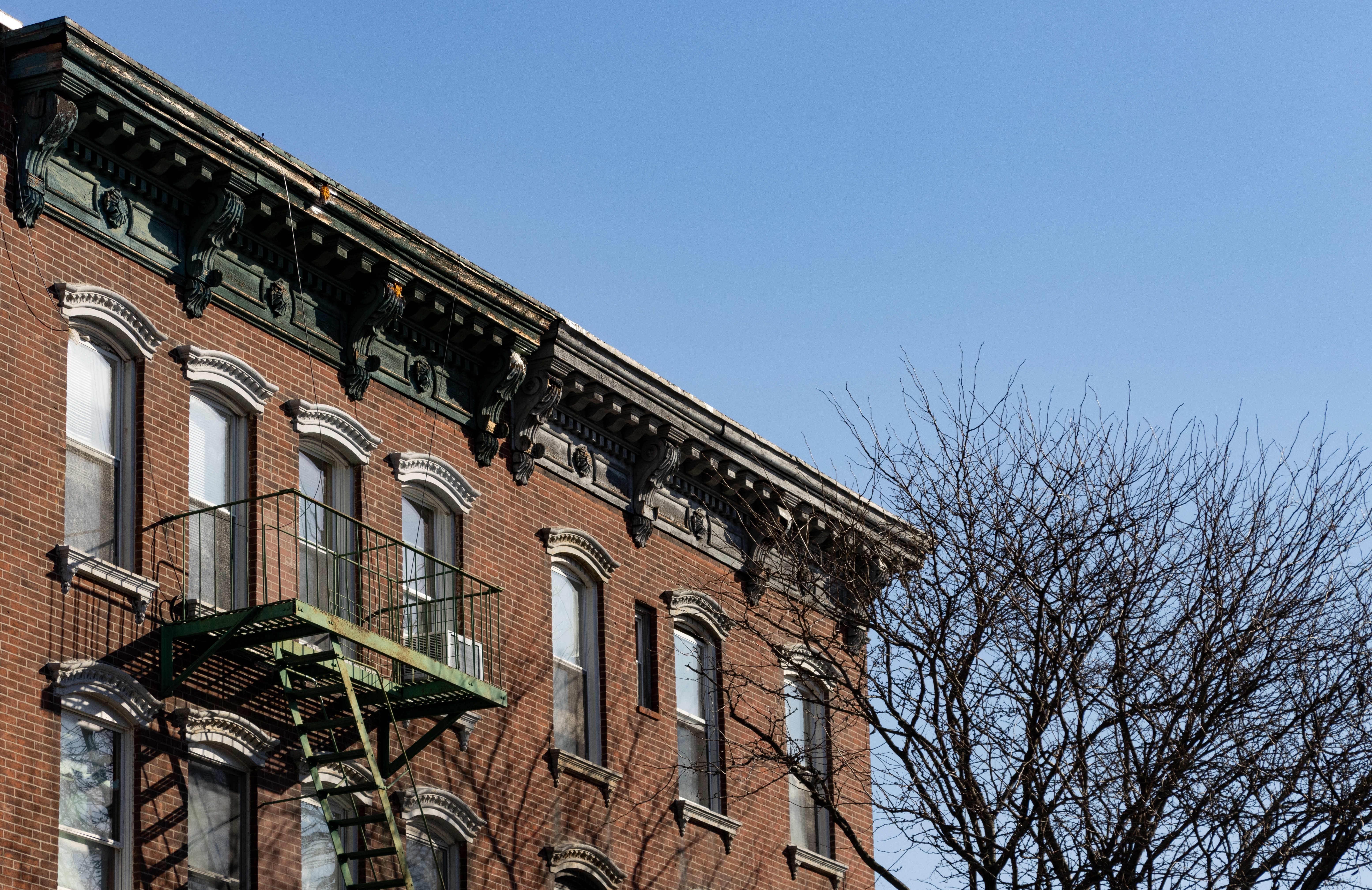 brooklyn - brick building in greenpoint with fire escape