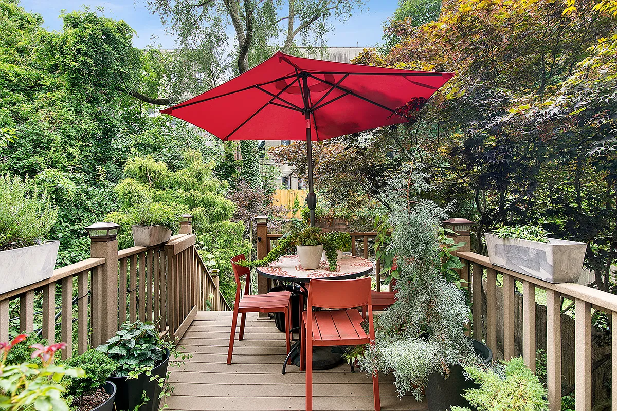 rear deck with room for a small table and planters