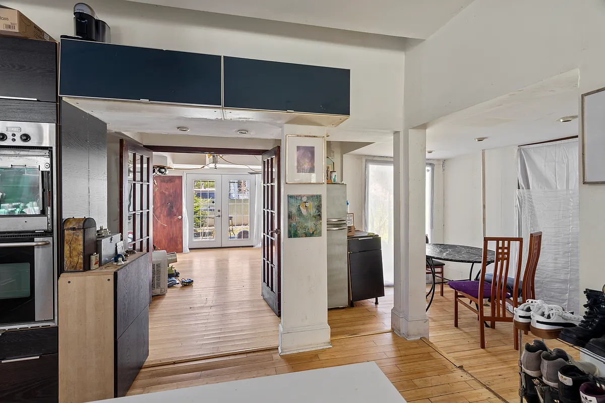 first floor kitchen and dining area with recessed lights, work in progress