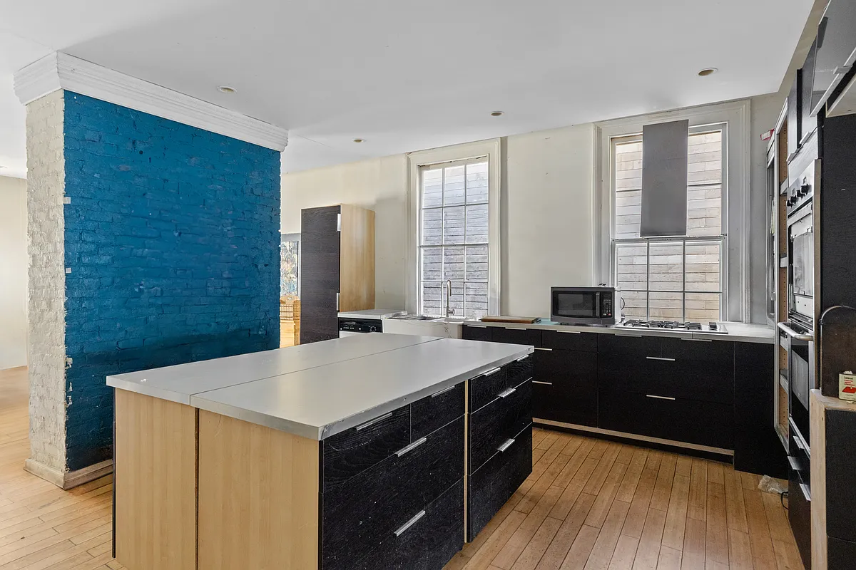 kitchen with black cabinets, recessed lighting