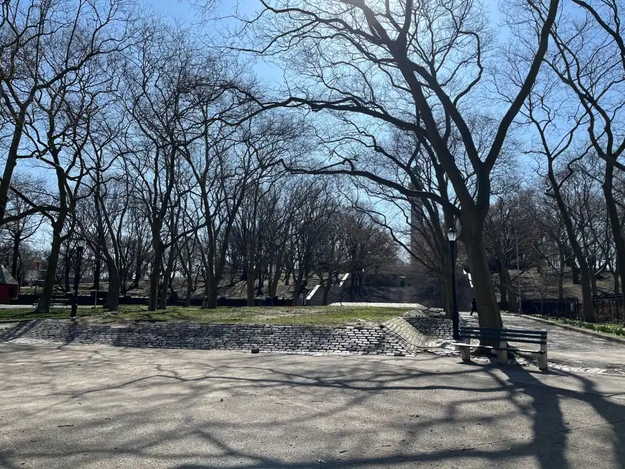 The “mounds” and trees in the park’s northwest corner.