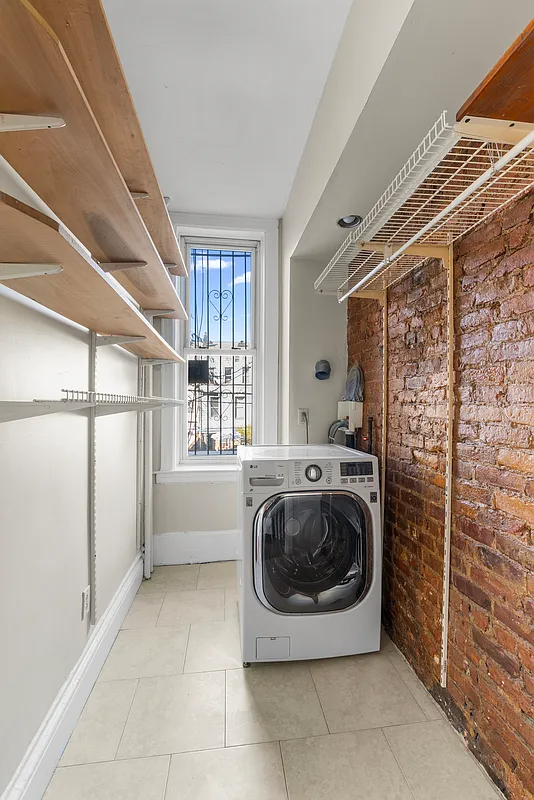 walk-in closet with laundry