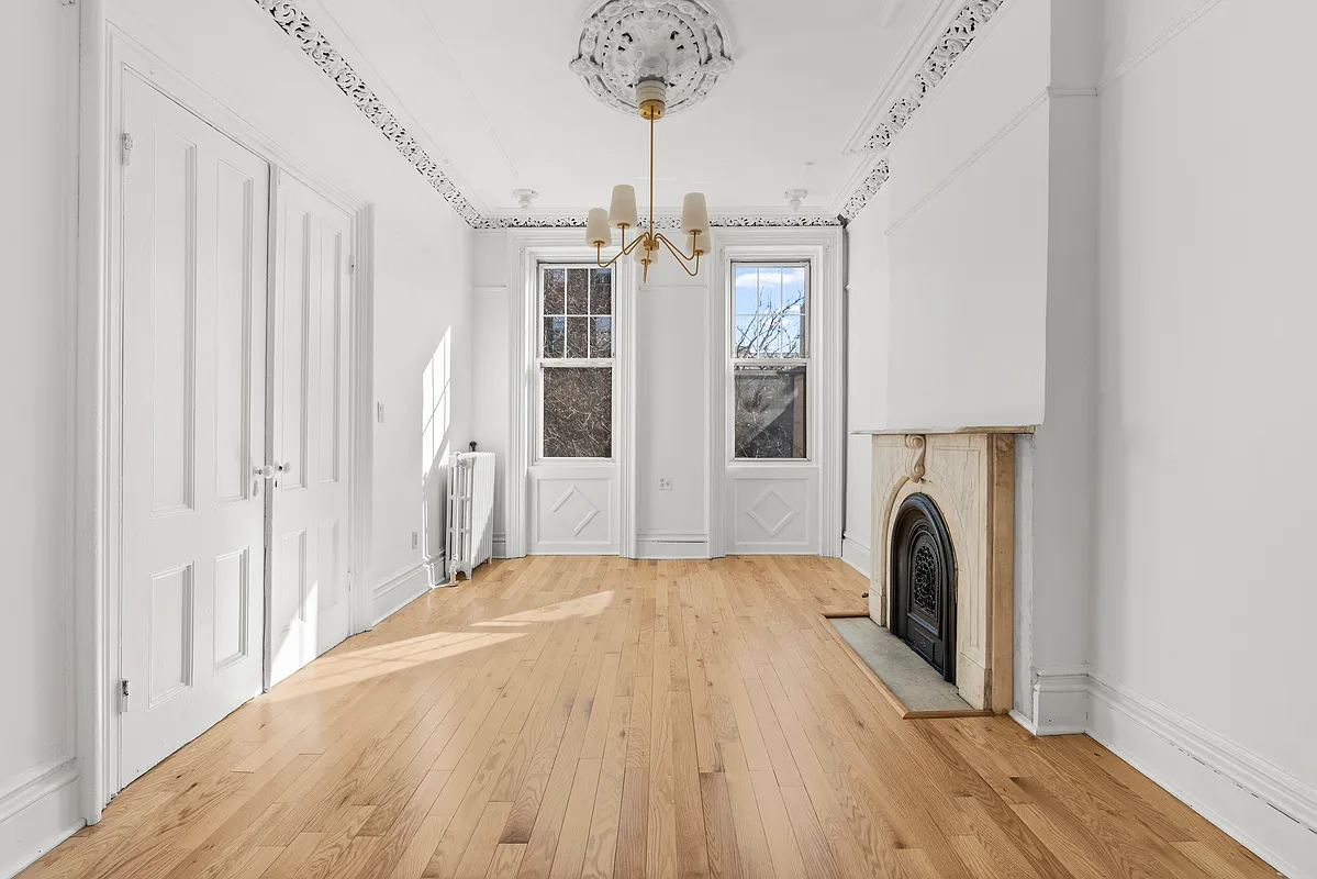 parlor level with marble mantel, plasterwork