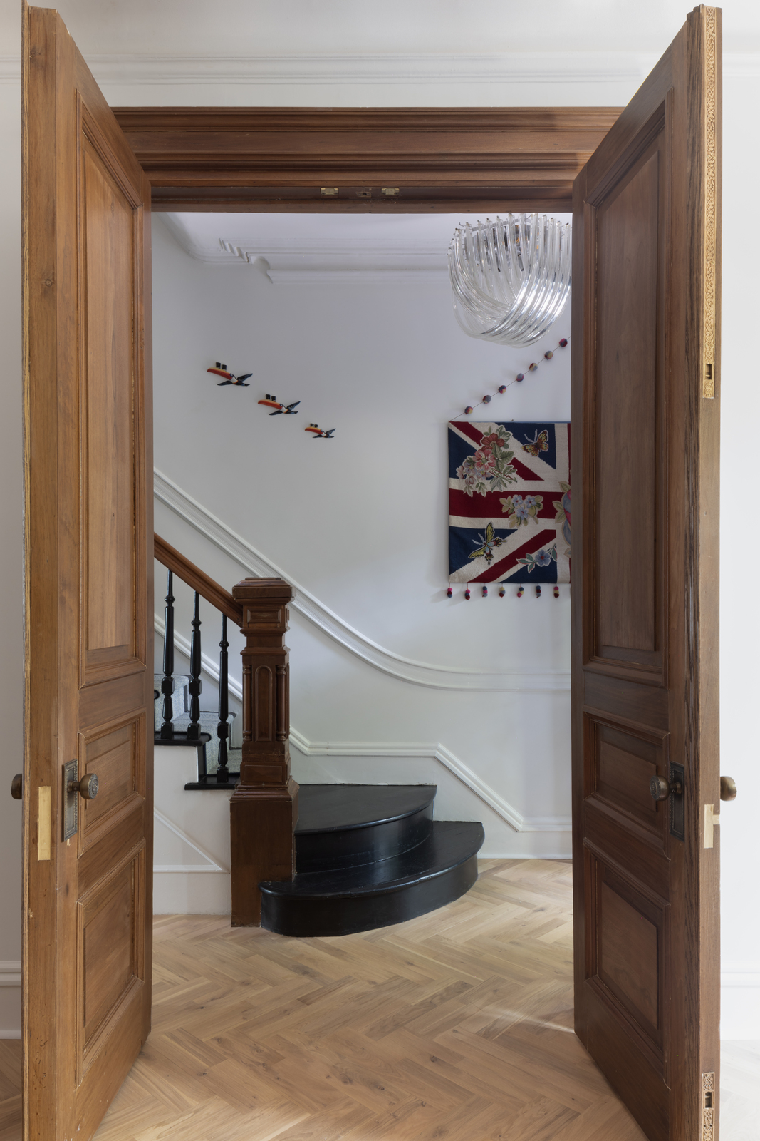 ENTRY FOYER WITH FRONT PARLOR DOORS OPEN