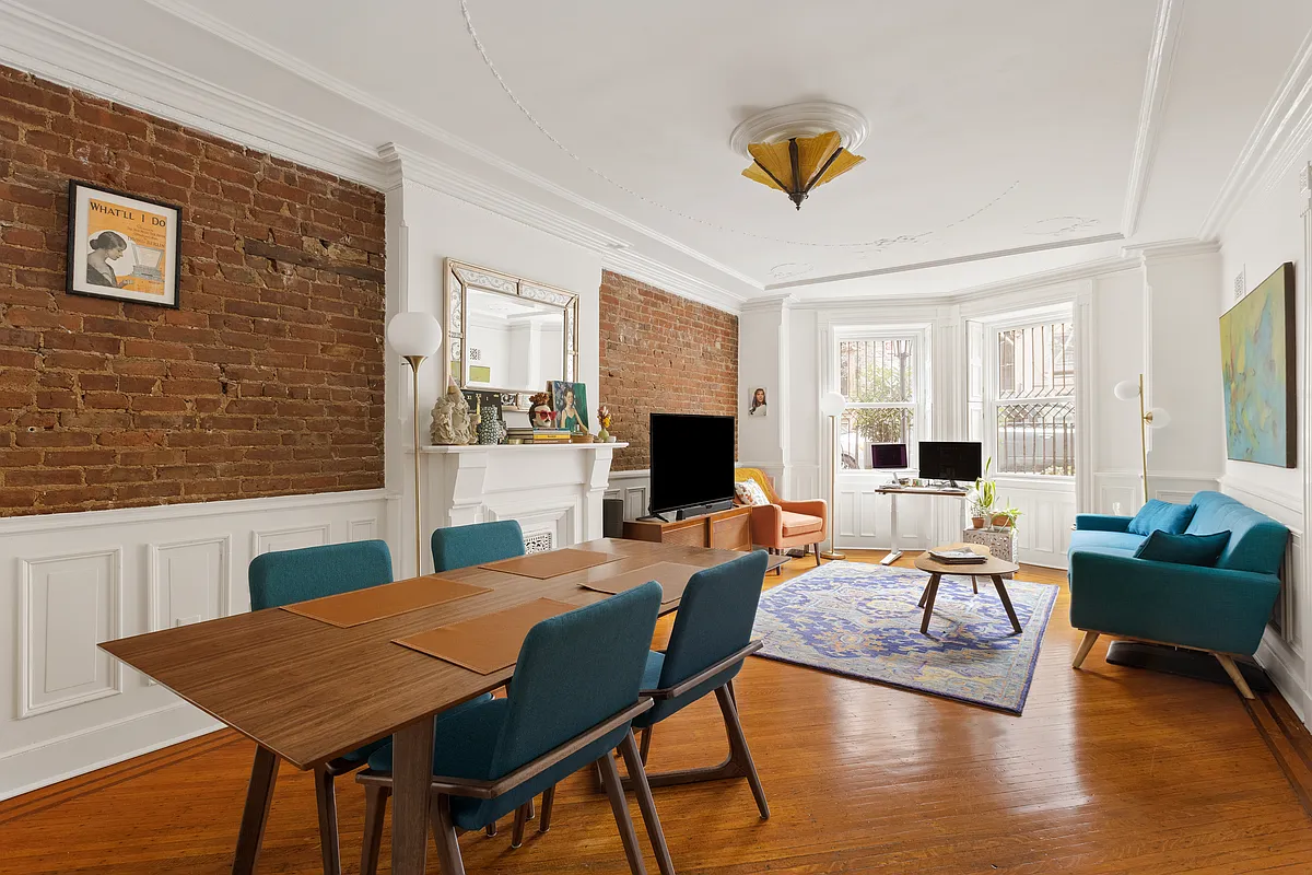garden level living and dining room with wainscoting
